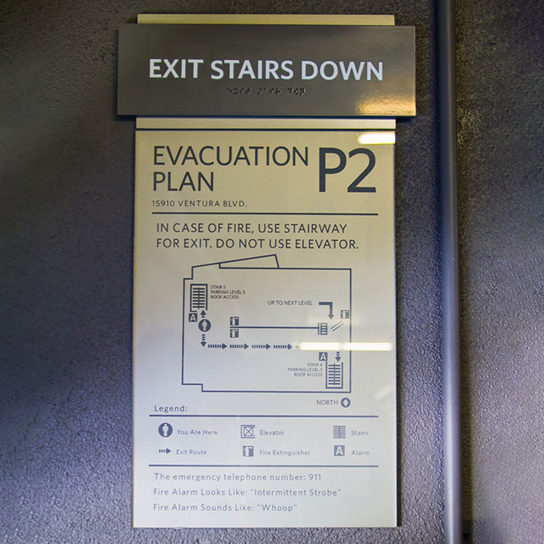 Evacuation compliance sign
